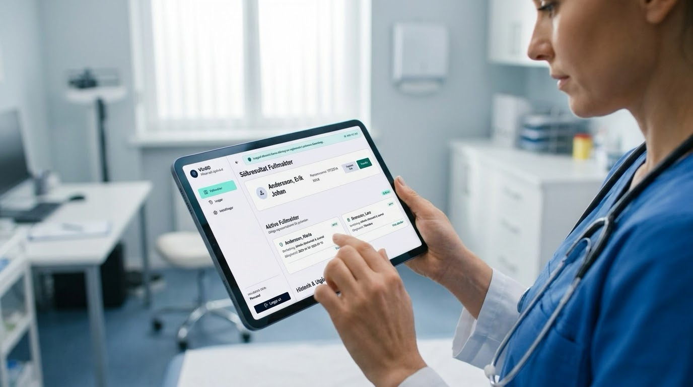 Vårdpersonal som hanterar digitala fullmakter på en surfplatta
